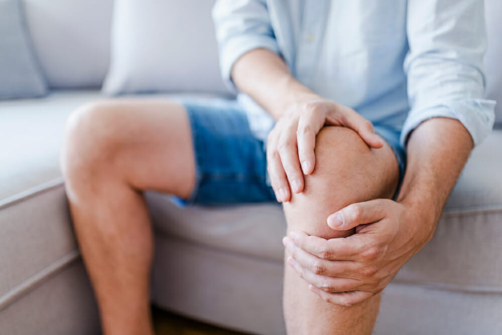 Man suffering from Rheumatoid knee pain