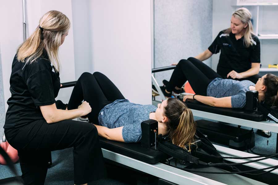 What is the difference between Reformer and Mat Pilates