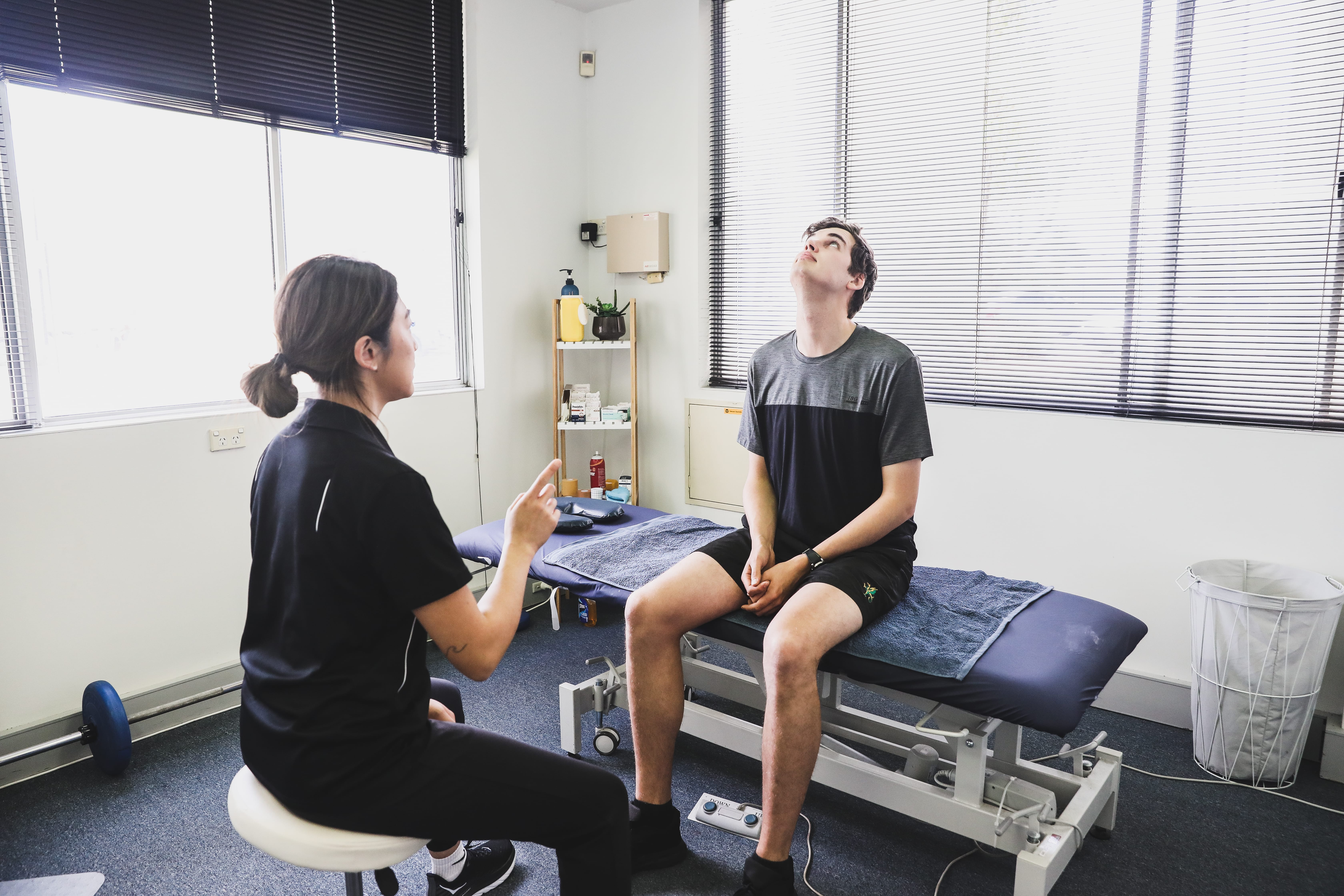 Physiotherapist guiding vertigo and Ménière’s disease rehabilitation.